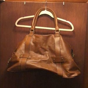 Brown faux leather duffle bag